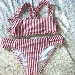 Pink and white bikini, one use.